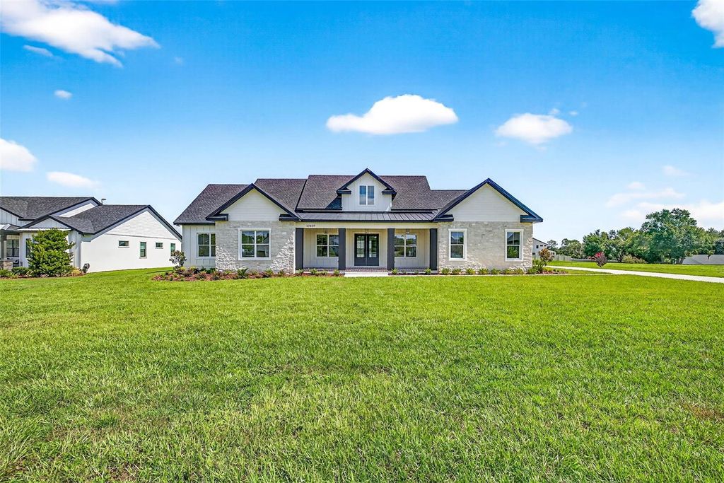 Photo of 32859 3rd Ave, San Antonio, FL 33576 (MLS # TB8416658)