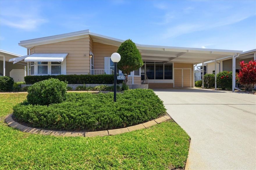 One or more photo(s) has been virtually staged. Welcome to this value-packed opportunity in the highly desirable 55+ community of Imperial Lakes Estates, where you own the land—no lot rent! Offering over 1,300 square feet of living space, this 2-bedroom, 2-bath home features a spacious and functional layout ready for your personal touches. Inside, you’ll find generous living and dining areas with built-in cabinetry and great natural light. The large enclosed lanai provides additional flexible space—ideal for entertaining, a hobby area, or expanded living space. Interior laundry adds everyday convenience, along with ample storage throughout; please note the washing machine and dishwasher are not currently operational and will need replacement. The home features a two-car carport, dedicated enclosed golf cart parking, and an oversized attached shed for a workshop or additional storage. Imperial Lakes Estates is an amenity-rich, well-maintained community known for its friendly, active lifestyle and is dog-friendly (2 dogs, 25 lb max each; buyer to verify). With low dues of just $544 per quarter, residents enjoy two heated pools, a spa, pickleball and tennis courts, shuffleboard, bocce, horseshoes, and a large clubhouse featuring a full kitchen, library, game room, and social spaces, along with a scenic 65-acre lake. Conveniently located with easy access to I-75 and I-275, you’re just a short drive to Tampa, St. Petersburg, Sarasota, and the Gulf Coast’s beautiful beaches. Whether you’re looking to update and make it your own or seeking a seasonal retreat at an attractive price point, this home presents an excellent opportunity in a sought-after and welcoming community.