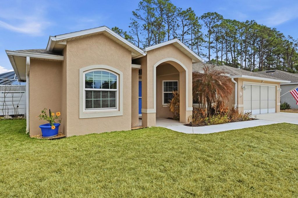 Photo of 75 Pheasant Drive, Palm Coast, FL 32164 (MLS # FC316177)