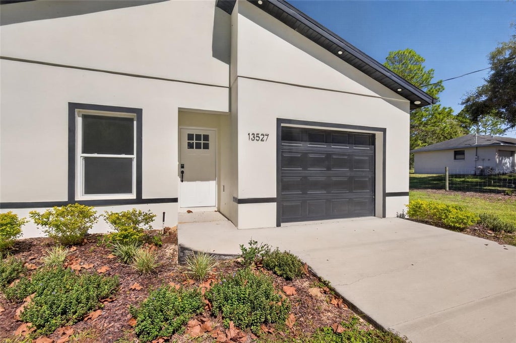 Photo of 13527 SW 100th Lane, Dunnellon, FL 34432 (MLS # O6452676)