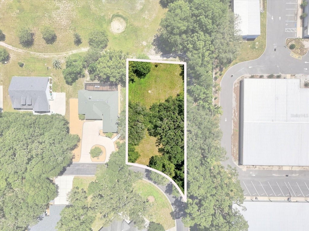 Photo of 512 Dowling Circle, Lady Lake, FL 32159 (MLS # O6433416)
