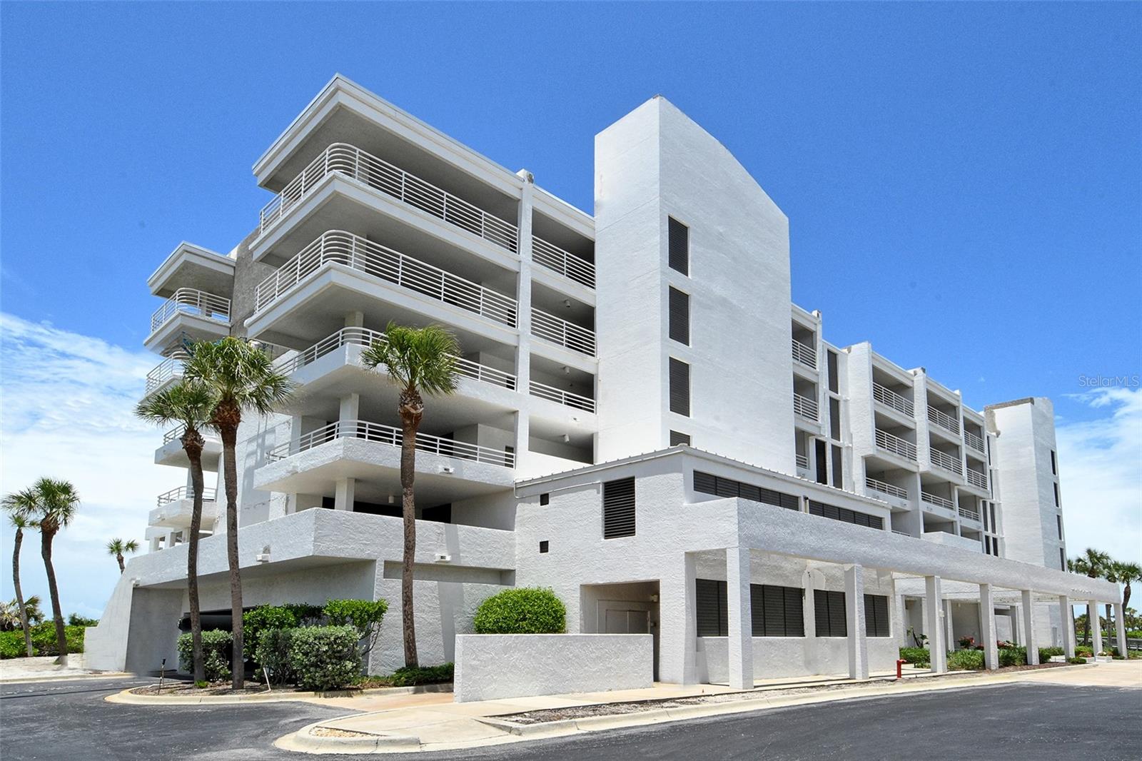 Welcome to your dream oasis. December 2024: Fully renovated, turnkey furnished unit, directly on the Gulf, at Sunset Beach. This stunning retreat boasts spectacular renovations, featuring a custom kitchen with solid wood cabinets, a light commercial-grade hood fan and elegant quartz countertops throughout. The kitchen has a GE Monogram induction stove with a convection oven, a GE Monogram refrigerator and dishwasher, and a Sharp microwave drawer. You can experience the conveniently located laundry room with a Speed Queen washer and dryer. Endless Tankless Tempra hot water system, bar fridge, and a new air conditioning unit. Both baths are equipped with Hansgrohe water fixtures and Kohler electric toilets. A complete trim package, including crown molding and solid core doors, enhances the finishings. Enjoy the seamless beauty of porcelain tile flooring throughout, complemented by a newer impact front door, high-impact windows, and patio slider. Additional features include remote-controlled window shades and fans. Exterior enhancements grace the common hallways with new ceramic tile. Sunset Beach, a small gated community on southern Longboat Key, features three mid-sized buildings south of Publix and CVS. You’ll find yourself close to a public library, tennis courts, banks, places of worship, restaurants, and Town Hall. Embrace the lifestyle just minutes from world-renowned St. Armand's Circle and Sarasota, where endless adventures await.