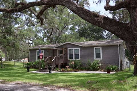 Photo of 9028 West Street, Brooksville, FL 34601 (MLS # TB8518787)