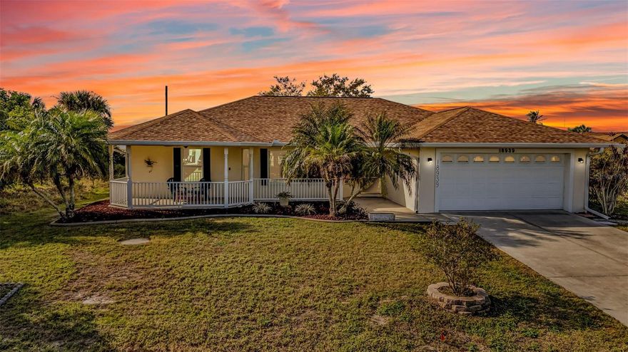 Nestled in serene Port Charlotte, this well-maintained 3 bed, 2 bath home sits in a quiet neighborhood surrounded by waterfront properties, offering peaceful living with no HOA or deed restrictions for maximum freedom. Recent upgrades deliver worry-free ownership: a durable 2022 roof, efficient 2020 water heater, powerful 2023 A/C system, manabloc plumbing for reliable performance, and hurricane impact windows for added storm protection—plus a home warranty provided at closing. Standout features include an attached 2-car garage, detached private workshop with 1-car garage, additional shed, fenced dog kennel area, inviting front porch, and relaxing lanai for indoor-outdoor enjoyment. Inside, tile and laminate flooring flows through spacious open living areas, a comfortable master suite with ample closet space, and flexible secondary bedrooms perfect for family, guests, or a home office—all on a private lot with low-maintenance appeal and endless potential. Schedule your showing today and make it yours!