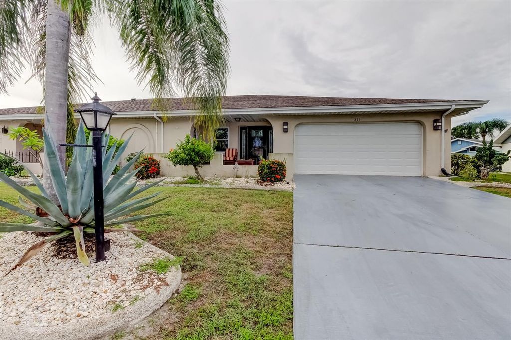 Photo of 329 Club Manor Drive, Sun City Center, FL 33573 (MLS # TB8427286)