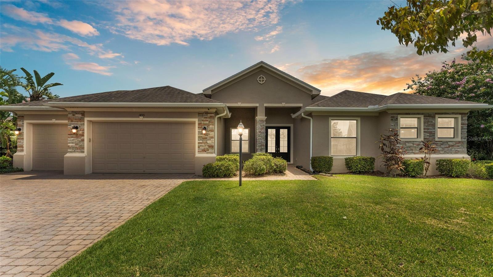 Exquisite 5-Bedroom, 4-Bathroom Home with Bonus Suite | 3,600+ Sq Ft in Gated Community
Welcome to 1455 Silver Leaf Dr—an exceptional residence tucked away at the end of a quiet cul-de-sac, offering over 3,600 square feet of beautifully designed living space in one of the area’s most sought-after gated communities.From the moment you arrive, the stone-accented façade, paver driveway, and manicured landscaping make a lasting impression. Inside, an open-concept layout features crown molding, warm wood laminate flooring, and a spacious living room centered around a cozy fireplace—perfect for both everyday living and entertaining.
The kitchen is equally impressive with granite countertops, stainless steel appliances and a large island ideal for gathering and meal prep.The main-floor master suite is a tranquil retreat with tray ceilings and a spa-inspired bathroom boasting dual vanities, a soaking tub, walk-in shower, and generous closet space. Four additional bedrooms and two full bathrooms are thoughtfully situated on the main level.Upstairs, a spacious bonus/media suite offers incredible flexibility with its own full bathroom and wet bar—perfect for guests, a game room, 6th bedroom, or private living area.Step outside to a peaceful backyard with no rear neighbors and tranquil pond views, providing the perfect canvas to create your dream outdoor oasis.Residents enjoy access to fantastic community amenities including a pool, clubhouse, and playground. Ideally located between Tampa and Orlando with quick access to I-4, and just minutes from everything Lakeland has to provide.
