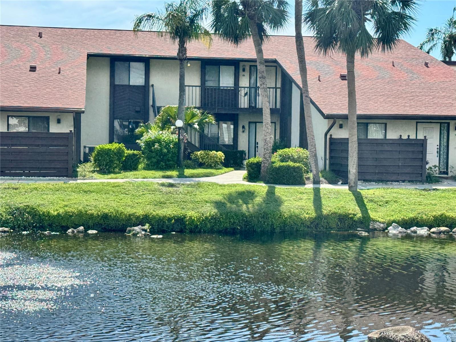 Welcome to easy Florida living in this beautifully furnished 2-bedroom, 2-bathroom condo with cathedral ceilings in the highly sought-after 55+ community of Morton Village in Bradenton. This turnkey second-floor unit (please note: no elevator) features stylish laminate and tile flooring throughout, offering low-maintenance comfort and style.
Enjoy your morning coffee or evening breeze from the screened-in balcony, a perfect spot to relax and unwind. The condo boasts recent updates, including a newer AC system and upgraded electrical panel (2023), ensuring peace of mind for years.
Morton Village offers a friendly, active lifestyle with access to a sparkling community pool and beautifully maintained grounds. Conveniently located just minutes from Gulf beaches, fine dining, shopping, and multiple golf courses, this home offers tranquility and accessibility.
Don't miss this opportunity to own a slice of paradise in one of Bradenton’s most desirable 55+ communities! Sellers are open to offers!