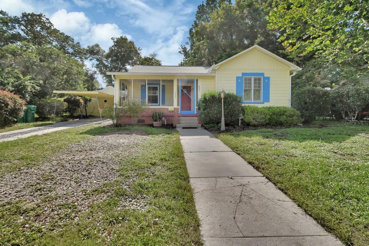 This delightful historic Craftsman bungalow is nestled on a spacious .24 acre lot in DeLand. NO HOA. From the moment you arrive, the inviting front porch offers timeless curb appeal—perfect for relaxing with your morning coffee or visiting with neighbors. Step inside and be surprised by how much space this home offers. The living room, dining and 2 bedrooms feature original wood floors, while much of the original millwork and hardware remains with timeless charm.
The split floor plan offers 4 bedrooms and 2 full bathrooms, the small 4th bedroom can be used as a bedroom, home office, or play space. The updated kitchen sits at the heart of the home with hardwood cabinetry and countertop space—perfect for cooking while entertaining those gathered around the dining room table.
From the dining area, step down into a spacious 25x10 bonus room with beautiful tongue and grove ceiling that leads into the primary bedroom and primary bath, tile flooring and large windows throughout this space provide amazing natural light.
Off the bonus room, you will find a generously sized utility or storage room with washer and dryer hookups, and convenient access through doors that open to the covered carport area. The fenced in backyard has mature landscaping and a variety of fruit trees, plum, mulberry and peach. This backyard has so much potential to be your private oasis.
Located just blocks from Stetson University and vibrant downtown DeLand, this home blends historic charm with modern comfort in an unbeatable location.
ROOF 2017, AC System 2017, Attic is floored with pull down stairs in hallway