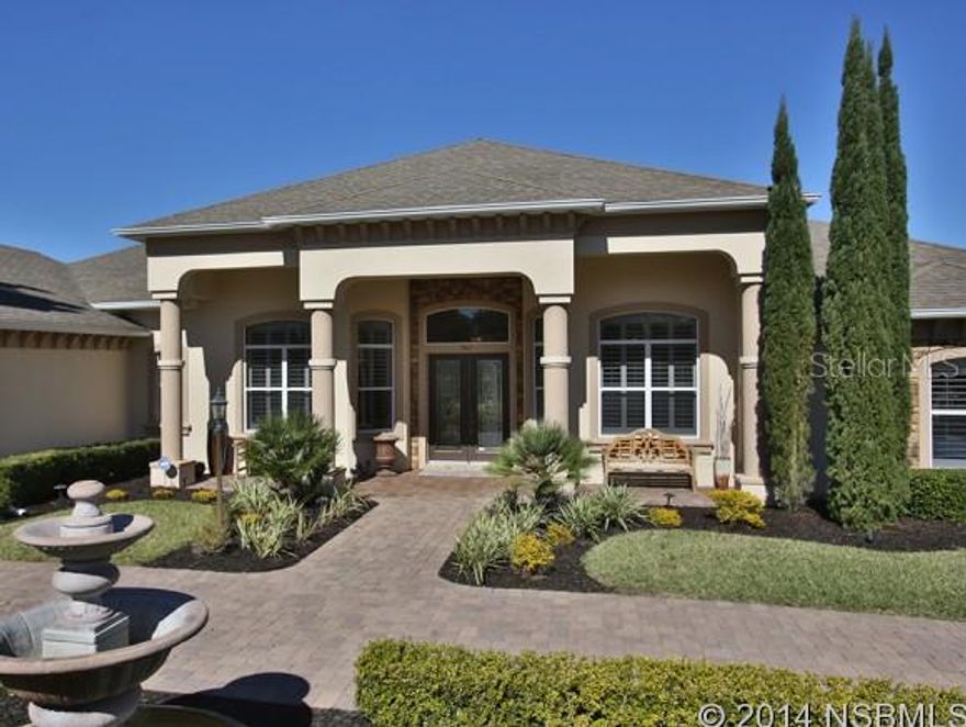 A unique executive home located in the luxurious "Rolling Hills" subdivision., The main home boasts 4 bedrooms, 3 bathrooms with kitchen and a two story attached guest cabana with a 2 bed, 2 bath with kitchen and 25x60 ft game room. The 16 ft entry way welcomes you with decorative columns and double entry doors into an open living room with a built in entertainment center and fireplace with gas logs. You will love this gourmet kitchen with SS appliances, granite, custom cabinets with under counter lighting, large pantry and a cafe' style eating area overlooking a beautiful lanai and oversized pool, outdoor bar and summer kitchen. You will admire the huge master bedroom with sitting area, oversized master closet, double vanity, spa tub and walk-in shower. Bring all of your toys for this separate 25 x 50 ft additional garage. A magnificent home with circular driveway, brick pavers, tropical landscaping, large covered porch, playground area for the family and much more. A rare find with this much space and luxury for this price. PERFECT IN-LAW QUARTERS ;Water: City