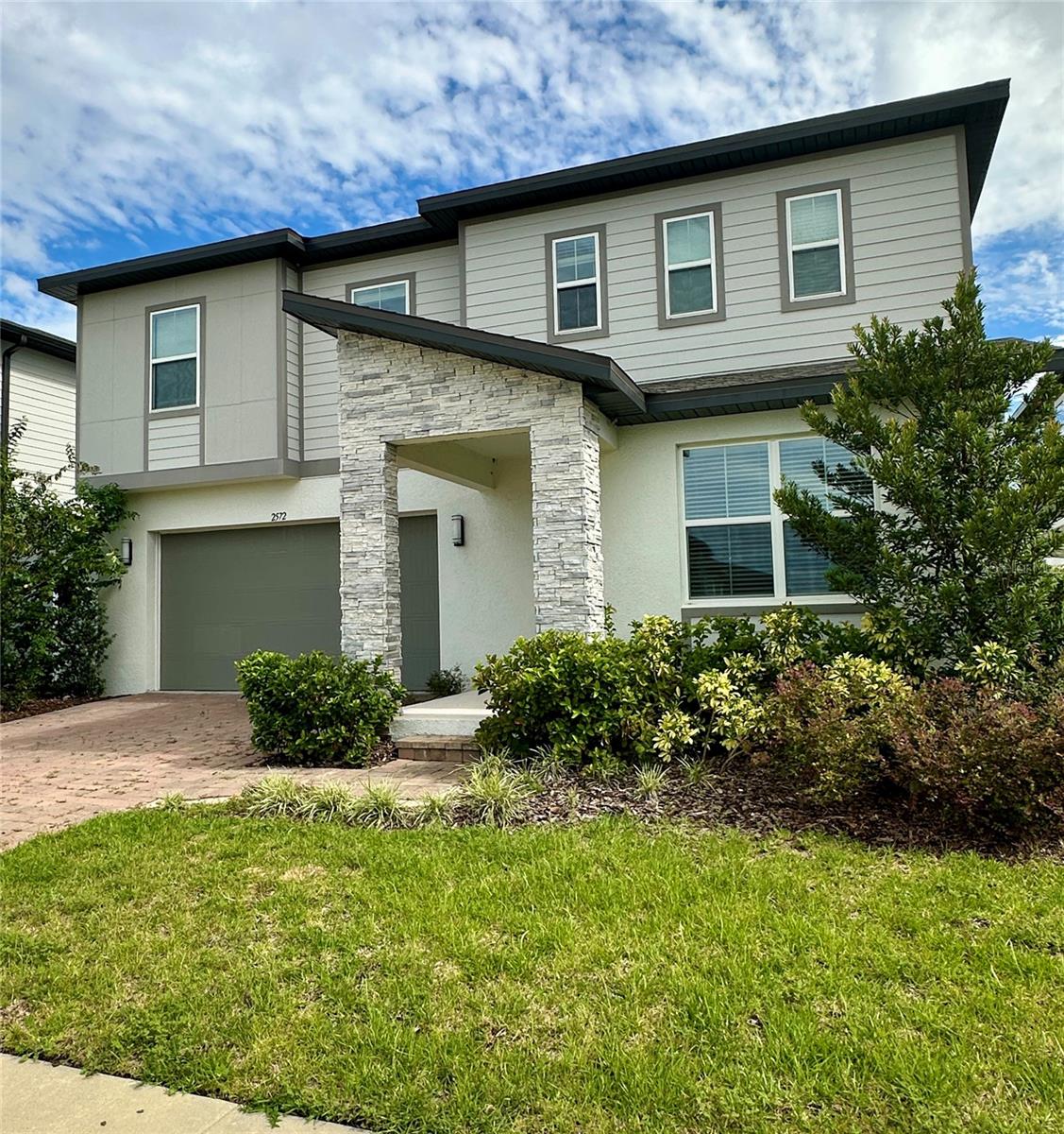 Beautiful 5-bedroom, 4-bath home for rent in the sought-after Villages at Minneola Hills. Built in 2022, this spacious 3,500+ sq ft home features a modern open floor plan, upgraded finishes, and a 2-car garage. Bright kitchen with walk-in pantry and solid surface counters. Enjoy privacy and security with a fenced backyard. Conveniently located minutes from top-rated schools, the new Publix plaza, future Crooked Can Brewery, and AdventHealth Minneola. Community amenities include walking trails, parks, and a planned resort-style pool. Easy access to Florida Turnpike for commuting to Orlando, MCO Airport, and theme parks. Don’t miss this great rental opportunity in a growing Central Florida community!
