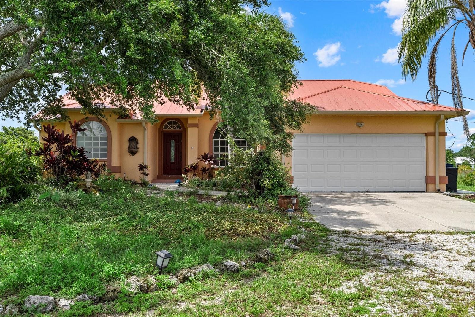 Welcome to your private equestrian retreat in the beautiful Trails of Panther Ridge! Set on 9.4 lush acres, this property offers the perfect balance of tranquility, functionality, and modern upgrades--All secured by a private gated entrance!
The home features an open floor plan with split bedrooms and tile flooring throughout. Off the primary bedroom is an office or bonus room. The spacious living room opens to a large patio area with an outdoor kitchen and an oversized heated swim spa—ideal for entertaining or relaxing while overlooking your private pond surrounded by a variety of fruit trees.
Major improvements include new air conditioning and ductwork (2021), water heater and garage door replaced (2022), and a long-lasting metal roof installed in 2017, giving you peace of mind for years to come.
Equestrian amenities abound with a well-appointed 10-stall, center aisle barn, where each stall is equipped with automatic waterers and fans. There's a tack room, hay storage above, and plenty of covered space for equipment. The property boasts six lush paddocks and is fully fenced with board and no-climb wire for safety and security.
Whether you're a serious equestrian or simply looking for a private slice of country paradise, this Panther Ridge gem delivers it all.