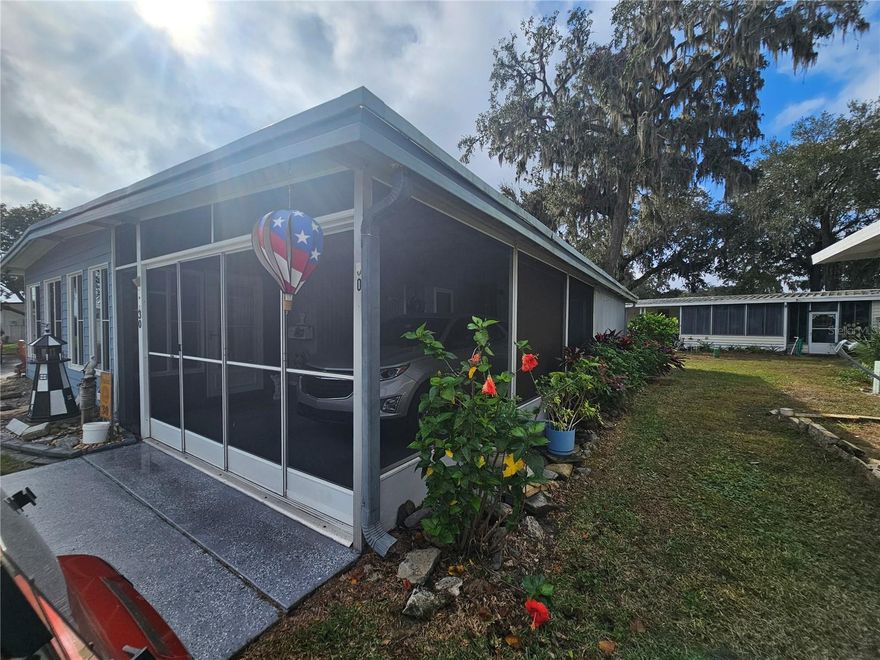Location!! location!! Great home located on a premium corner lot with a peek a boo shot of the lake. Harbor Oaks active community on the water. The house has been updated with luxury vinyl floors, resin counter tops, new roof over, nice fully screened in carport, huge shed for storage and much more. Call or text today , you wont want to miss this home!! 
The amenities at Harbor Oaks have been developed over the years to enhance the joy and relaxation of our residents. You can walk through our scenic neighborhood, ride your bike through our gentle hilly streets, drive your golf cart through the park to visit friends, fish at the pier, or take your boat out on Lake Griffin, part of the chain of five lakes in the area. 
The clubhouse, a great place to be, as there are lots of activities going on; Thursday Morning Coffee Hour (donuts too), Library, TV, WiFi, Cards, Bingo, pool, Karaoke, Dances, Arts and Crafts and more. We even have our own Harbor Lites Band.
Shuffleboard can be played any time, plus there is a league in the fall as well. Come and play with a small or large group.  
Cornhole is a game where everyone can join in. Choose to play with your own group or join the fall league. There's even a tournament in the spring. Check out the photo albums for pictures.
Pétanque courts, Pétanque is also known as Boule and Bocce. The objective is to score points by having boules closer to the target than your opponent after all boules have been thrown. 
Image of horseshoe pits. 
Horseshoes is a fun game to play when friends gather for some friendly competition.