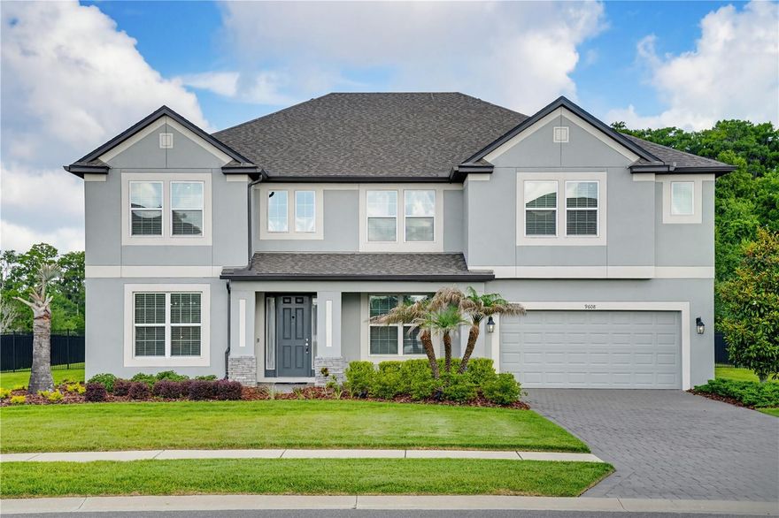 This Exceptional Estate delivers a combination that is rarely available in the Tampa market: 7 Full Bedrooms, 2 of which are Primary Suites, 5.5 Baths, over 5,500 square feet, 1/2 Acre homesite, premium wood floors throughout, conservation & pond views, 3-car tandem garage, fully fenced backyard & a huge loft with wet bar & balcony! Designed for those who don't want to compromise on scale, functionality & quality, this home offers expansive living spaces, elevated finishes, and a flexible layout ideal for multigenerational living, entertaining, or large households. Situated in the gated neighborhood of Toulon, just 20 minutes from Downtown Tampa!
Built by M/I Homes in 2021, the Grandsail III is purposefully designed for comfortable, large scale living. The 8-ft front door opens to a soaring 2-story entryway anchored by the staircase, the formal dining room and office. Upscale wide-plank wood flooring extends throughout the home creating a clean, cohesive aesthetic and serving as one of the property’s most significant interior upgrades. 
The kitchen, breakfast nook, and family room all connect in an open-concept layout. The gourmet kitchen features upgraded white shaker cabinetry with crown molding, quartz countertops, double ovens, a large center island with a farmhouse sink, designer pendant lights, stainless steel GE appliances, breakfast nook, an oversized walk-in pantry, & a butler’s pantry connecting to the dining room. The Family Room has ample space for your coziest couches, additional recessed lighting, oversized windows for natural light & sliding glass doors that open to the covered patio.
The Downstairs Primary Suite offers tranquil backyard views, 2 walk-in closets, and a spa-inspired bath with marble-look tile, dual vanities, a corner garden tub, oversized walk-in shower, and linen storage. Bedroom #2 is also situated on the 1st floor with an adjacent full bath creating an ideal setup for extended family, guests, or future pool access.
Upstairs, the home continues to impress with a 550 sqft loft featuring a tray ceiling, a wet bar complete with sink and beverage refrigerator, & access to the 2nd story balcony overlooking the pond & conservation. 
The 2nd story includes 5 additional bedrooms, including a spacious 2nd Primary Suite. The other 4 bedrooms all have walk-in closets and share 2 Jack & Jill bathrooms. The rooms are huge in comparison to most floorplans! Bedroom 6 is exceptionally large and offers flexibility for a media room, gym, playroom, or additional living space.
Additional features include a 3-car tandem garage, oversized downstairs laundry room, under-stair storage, extra recessed lighting, pre-wire for a future pool, full-house gutters, driveway pavers, and extensive storage throughout.
Tired of seeing homes with tiny backyards? This1/2 acre homesite offers exceptional space for a future pool, outdoor entertaining areas, or a custom backyard oasis overlooking the pond and conservation area.
Positioned near the I-4 corridor, Toulon offers convenient access to Downtown Tampa, Lakeland, Wesley Chapel, and surrounding areas, making this an exceptional opportunity for buyers seeking luxury-scale living, land, and connectivity within Central Florida.