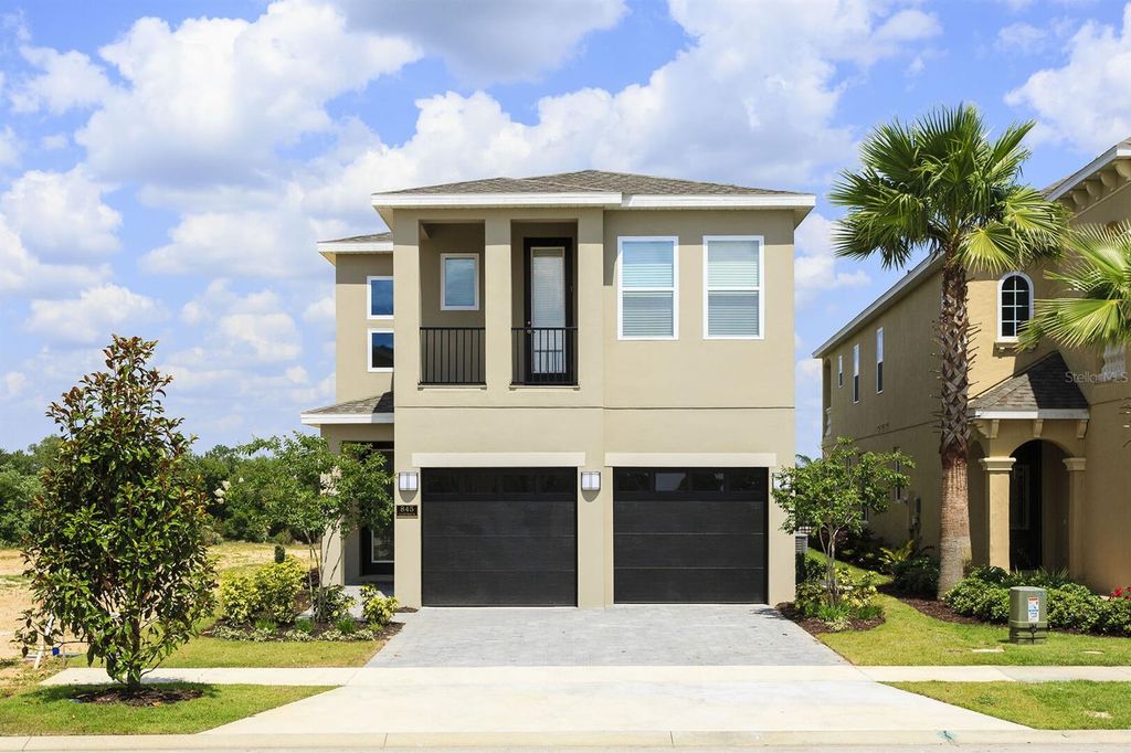 Photo of 845 Golden Bear Drive, Reunion, FL 34747 (MLS # O6386878)