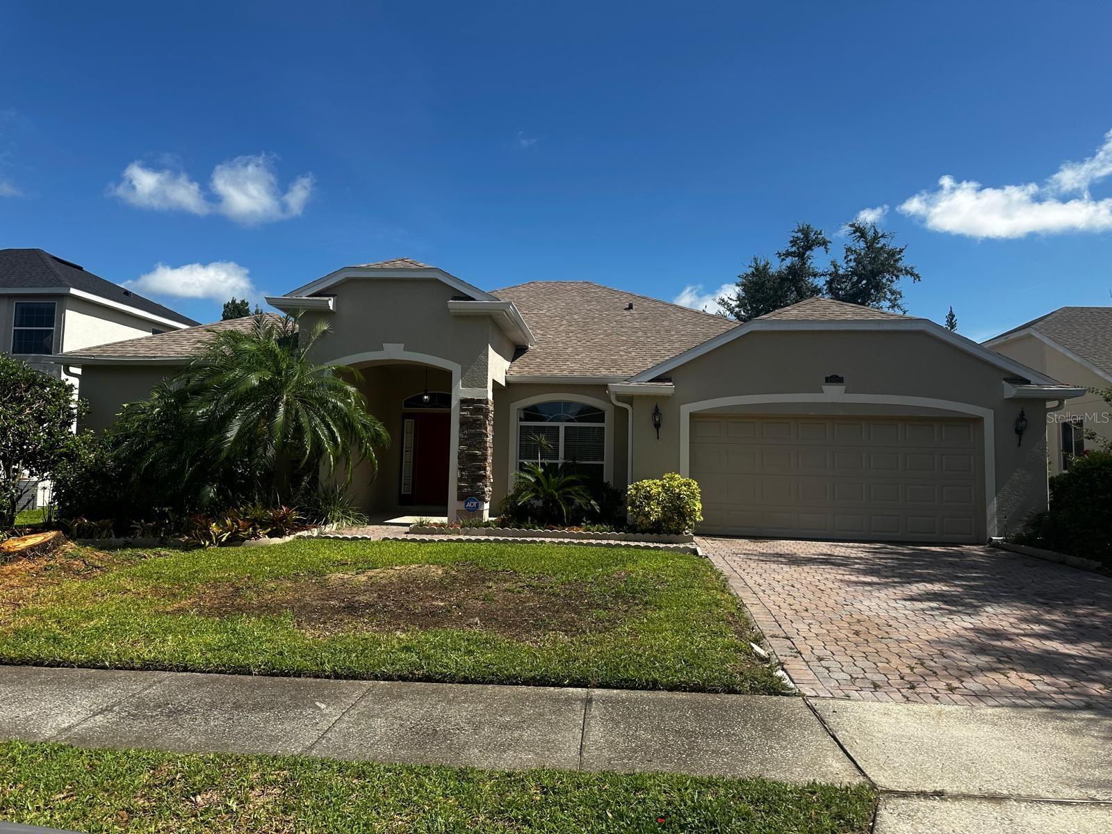 This beautiful 4 bedroom, 3 bath home with fully fenced in backyard located in Tradd's Landing. Spacious bedrooms with split floorplan. Master bedroom has a bonus room that can be used as an office or sitting area with slider to outside lanai. Large ensuite bath with garden tub, dual vanities, separate glass shower, and two walk-in closets. Kitchen includes stainless steel appliances, Corian countertops, built-in desk and double pantry. Kitchen open ups to living room with sliding door to screened in lanai with fenced in backyard. washer, and dryer included. Community features community pool, playground, recreational area. Located closet to major highways, restaurants, shopping, parks, and theme parks. Call or text to schedule a showing today.