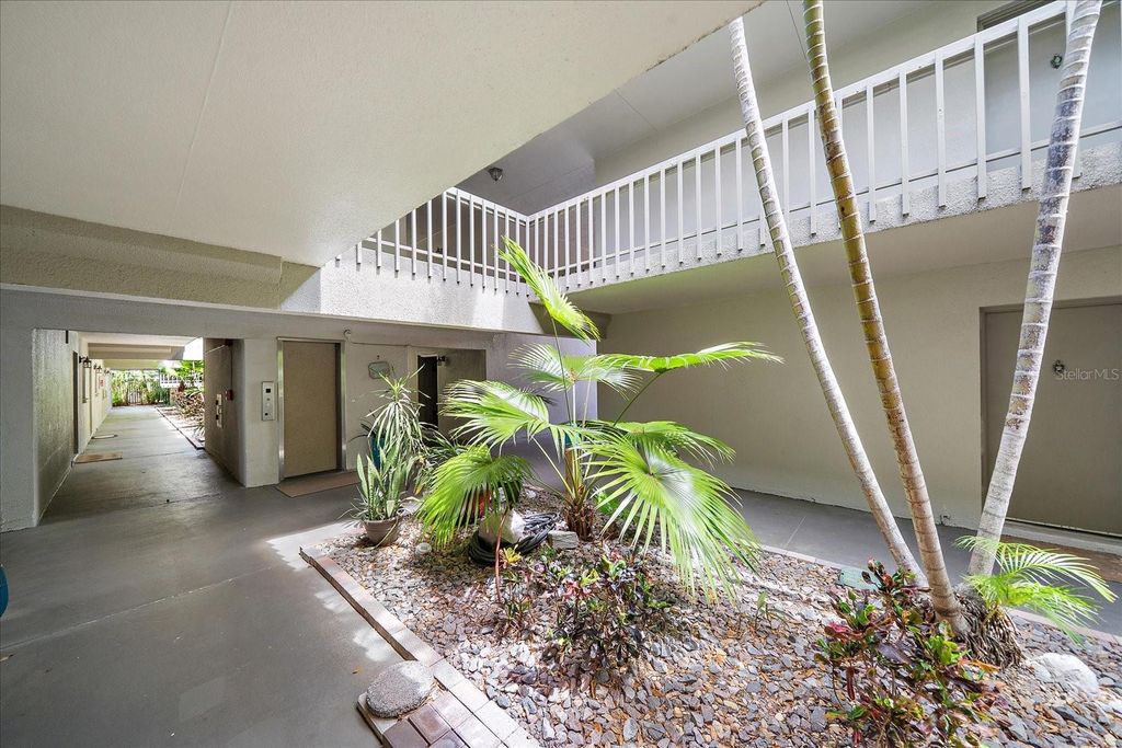 Photo of 3360 S Osprey Avenue #104B, Sarasota, FL 34239 (MLS # A4688292)