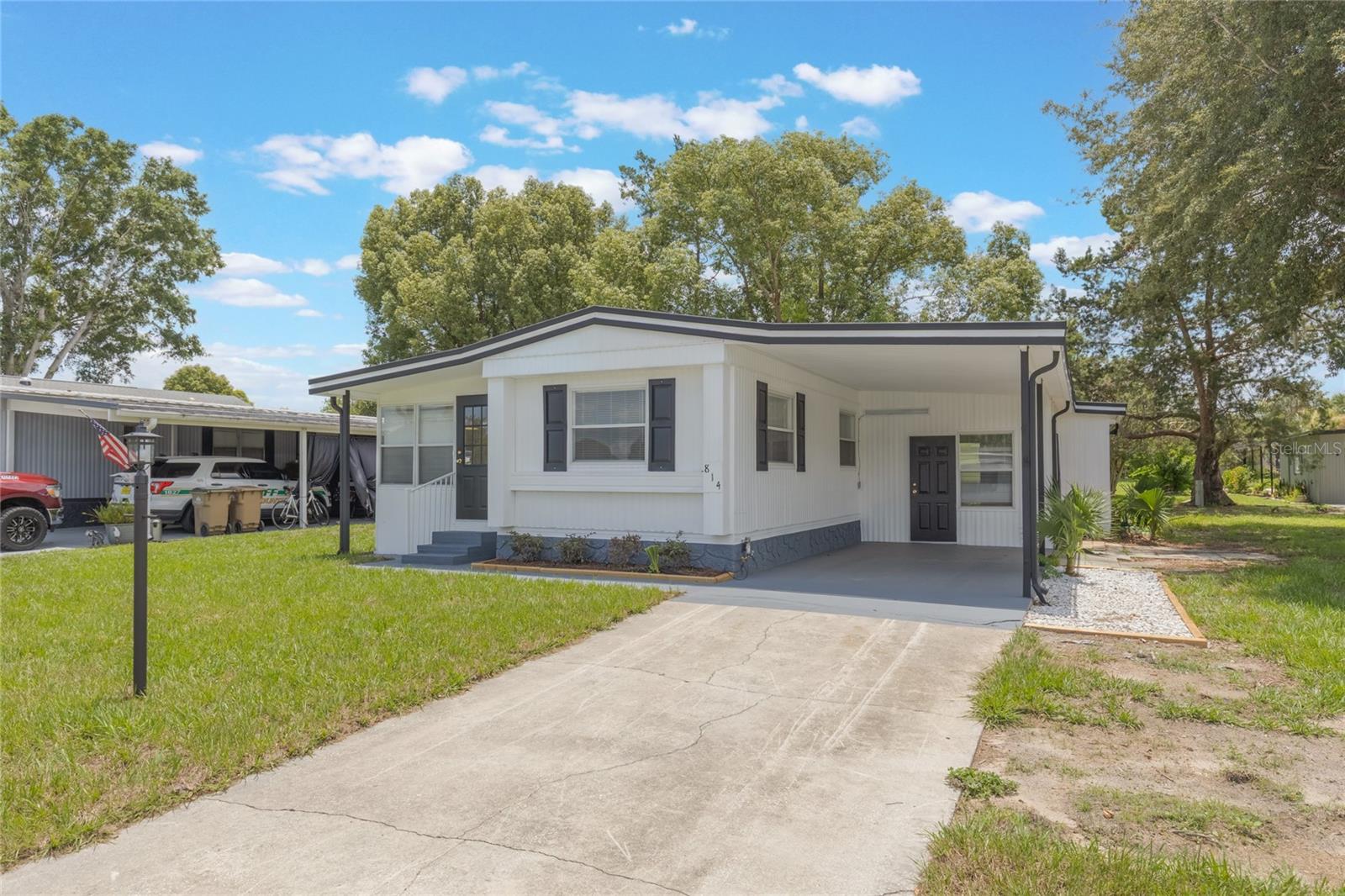 This adorable fully renovated manufactured home is the perfect opportunity to join the amazing community of The Villages! Located in a charming golf cart community, everything in this home is fresh and clean- brand new kitchen, bathrooms, AC, Hot water heater, paint and floors. This home has also been replumbed and has all new windows too! It's like a brand new home! With 2 bedrooms and 2 bathrooms, there's room for a family, a roommate, or use the extra room as your office, craft room, kitty condo, etc! All you have to do is move in and start enjoying the sunny Florida lifestyle. 2 pets are allowed with deposit. Application and fee will be made through RentSpree.