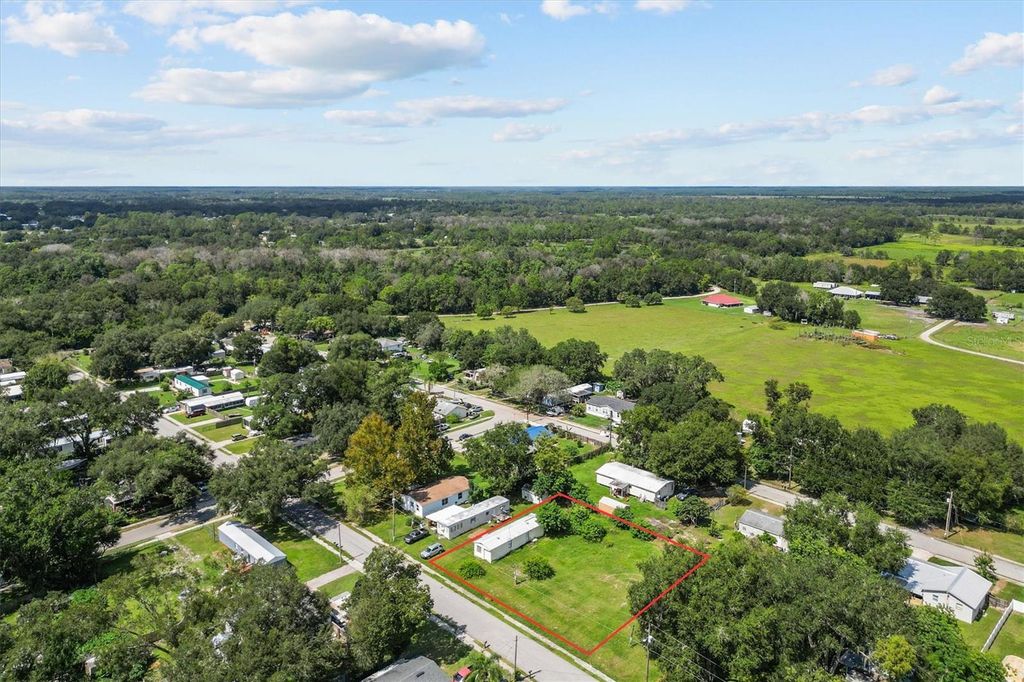 Photo of 636 3rd Street, Polk City, FL 33868 (MLS # TB8434199)