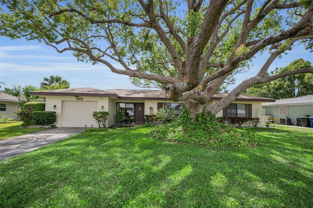 Photo of 409 Graham Drive, Clearwater, FL 33765 (MLS # TB8502454)