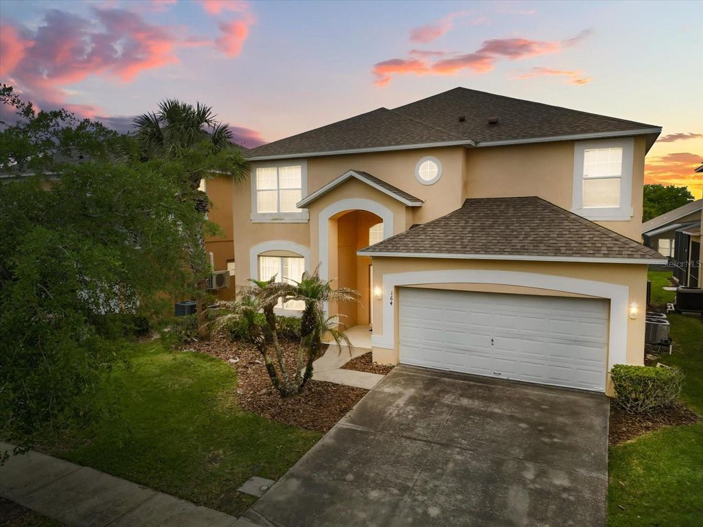 Photo of 164 Castaway Beach Way, Kissimmee, FL 34746 (MLS # O6401551)