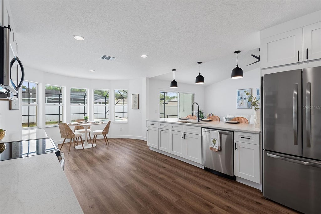 Photo of 34 Woodhollow Lane, Palm Coast, FL 32164 (MLS # FC321672)