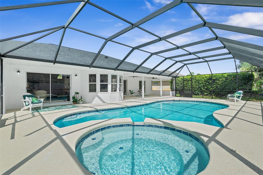 Photo of 34 Woodhollow Lane, Palm Coast, FL 32164 (MLS # FC321672)