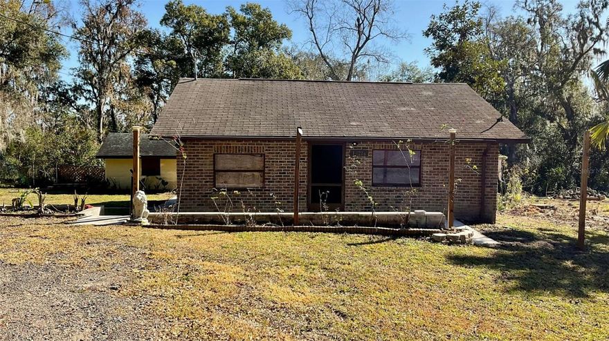 Must see 2/1 block home on a spacious 1/2-acre lot. No HOA fees or drama! Located just outside the much sought after city of San Antonio. Inside you can relax in your spacious living room. There's new Brunette Oak Vinyl floors in living and bedrooms, as well as black granite tile flowing from the kitchen through the hall and bathroom. The tankless hot water system allows you to enjoy endless hot water while the steam rolls off the grey marble and granite in the custom walk-in shower. With a double loop driveway you have easy access to Curley Rd. and plenty of parking. From the large open front porch flowing into the sunken courtyard leading to the newly finished sundeck. You will be able to enjoy the sun, moon or stars or just unwind in your private fenced back yard. Lots of room for your toys. The block bonus building has RV set up including 30-amp breaker and septic hook up behind it. The outbuilding also has washer dryer hook- up, internet connection (Cat-5) and widow unit ac. Get away from the subdivisions and have the freedom and privacy of country living. St. Leo University and San Antonio Elementary are just minutes away. Mirada and Epperson Lagoons are less than 5 miles away. 10 minutes from I-75, and 15 minutes from all the amenities of Wesley Chapel and 40 minutes to TIA.