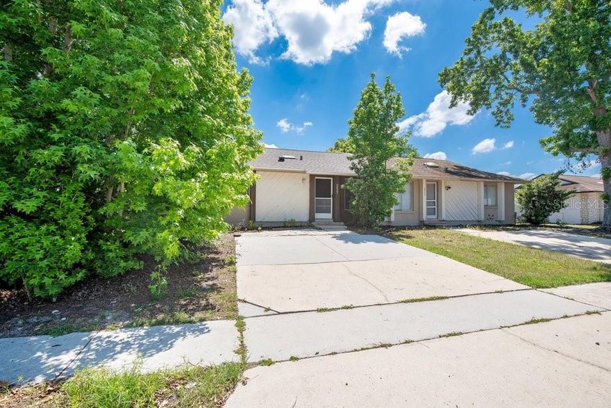 One or more photo(s) has been virtually staged. INVESTMENT OR FIRST HOME OPPORTUNITY IN EAST ORLANDO NEAR UCF!  A beautifully updated  1//2 DUPLEX in East Orlando offering modern upgrades, move-in ready convenience, and an unbeatable location.  From the moment you step inside, you’re greeted by tile flooring throughout, a highly desirable feature for Florida homes that offers durability, easy maintenance, and a clean, cohesive feel. Natural light fills the space, leading you into the heart of the home with a remodeled kitchen (2020) designed for both everyday living and entertaining.  The kitchen showcases granite countertops, stainless steel appliances, and chocolate cabinets, making it a standout feature for buyers searching for a modern kitchen in Orlando. Whether you're hosting guests or enjoying a quiet night in, this space delivers both style and functionality.  This home features 2 spacious bedrooms and 2 updated bathrooms.  Step outside to your large, fully fenced backyard, ideal for buyers looking for homes with outdoor space in Orlando. With plenty of room to create a patio, garden, or entertainment area, this yard offers flexibility and future potential.  Have a peace of mind knowing that this home comes with major system upgrades include: 2023 Roof, 2022 A/C, REPLUMBED & WATER HEATER 2022.  Located in a prime East Orlando location near the University of Central Florida (UCF), Lockheed Martin, this home offers easy access to 417, 408, Waterford Lakes Town Center, shopping, dining, and major employers, making it ideal for UCF students, faculty, professionals, and investors alike.