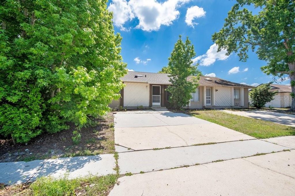 Photo of 2827 Coral Reef Drive, Orlando, FL 32826 (MLS # O6400580)