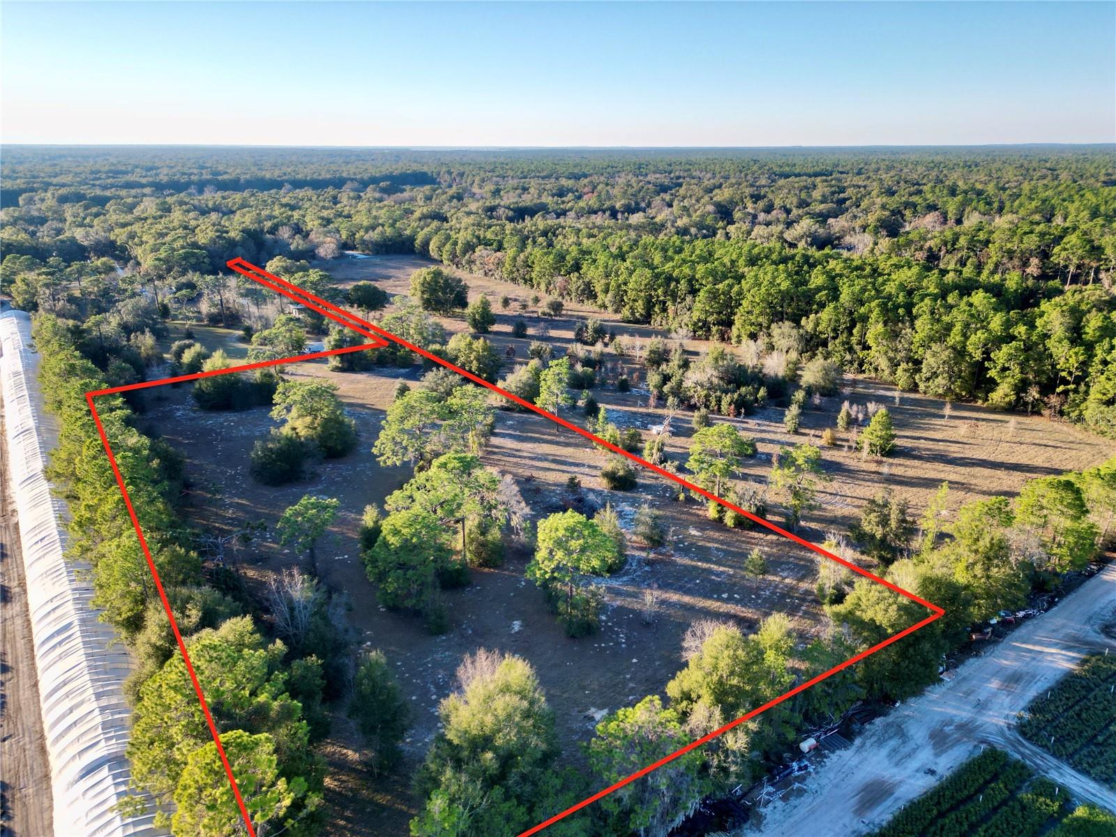 Motivated Seller – Seller Financing Available for Qualified Buyers! 5-Acre Parcel Near WEC ideal for Agricultural Development. This parcel offers a prime opportunity for agricultural development, located just a short drive from the World Equestrian Center (WEC). The property is well-suited for a variety of uses, including a mini farm, hobby ranch, or agricultural venture, and provides ample space for future growth. The land is newly fenced, ensuring security and privacy for livestock or agricultural operations. It also benefits from an easement providing direct access to 110th, offering convenient connectivity to the main road and facilitating easy transportation to and from the property. The location combines the tranquility of rural living with close proximity to essential services, including restaurants, hospitals, gyms, and other amenities. With quick access to Hwy 200, this property is perfectly situated to provide both seclusion and convenience. This is an exceptional opportunity to develop a rural retreat or agricultural property. Don’t miss your chance to invest in this versatile parcel. PARCEL ID - 35319-006-03 is also for sale.