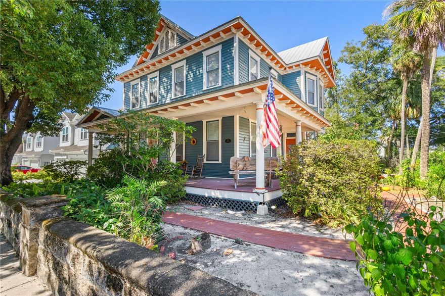 This is it! A rare opportunity to own this incredible, spacious 1913 home in the heart of the highly sought-after Tampa Heights!  Complete with a picturesque corner lot, this historic gem showcases incredible craftsmanship throughout—featuring 11.5-foot ceilings, detailed crown molding, and stunning original soffits that reflect the artistry of a bygone era.
Enjoy classic curb appeal with a gorgeous wraparound porch—perfect for relaxing under the shade of mature oak trees. The fully fenced backyard offers large double gates for secure access, ample parking, a covered carport that can double as a patio, and a newer hurricane-strapped shed for extra storage. 
Step inside to a beautiful, light-filled, grand entryway which leads you to an elegant and spacious formal dining room —perfect for entertaining. The separate and spacious living room includes a cozy gas fireplace and showcases gorgeous, tall windows. The retro-inspired kitchen features newer stainless steel appliances, including a gas range, and a charming, built-in breakfast nook.  A first-floor den is currently being used as a 4th bedroom for guests but has the flexibility to also be your new home office. The first floor also boasts a full bath and the convenience of an indoor laundry room. Upstairs, you’ll find two additional bedrooms, and a very large primary bedroom with it's own fireplace and a large full bath complete with a claw foot tub to soak in after a long day. The fully insulated attic, already plumbed for another bathroom, offers endless potential for a private retreat, studio, or additional living space.
Well maintained with a durable metal roof (2006), newer HVAC (2022/2023), and a commercial-grade gas tankless water heater (2018, 250k BTU). Located just minutes from Armature Works, Downtown Tampa, the Riverwalk, Riverside Heights, and Seminole Heights, with easy access to I-275, I-4, Ybor City, and Channelside—this location is truly unbeatable! 
Priced to move so don’t miss out on this rare opportunity to own a truly amazing, historic home—filled with character, quality craftsmanship and all the modern features you could want!