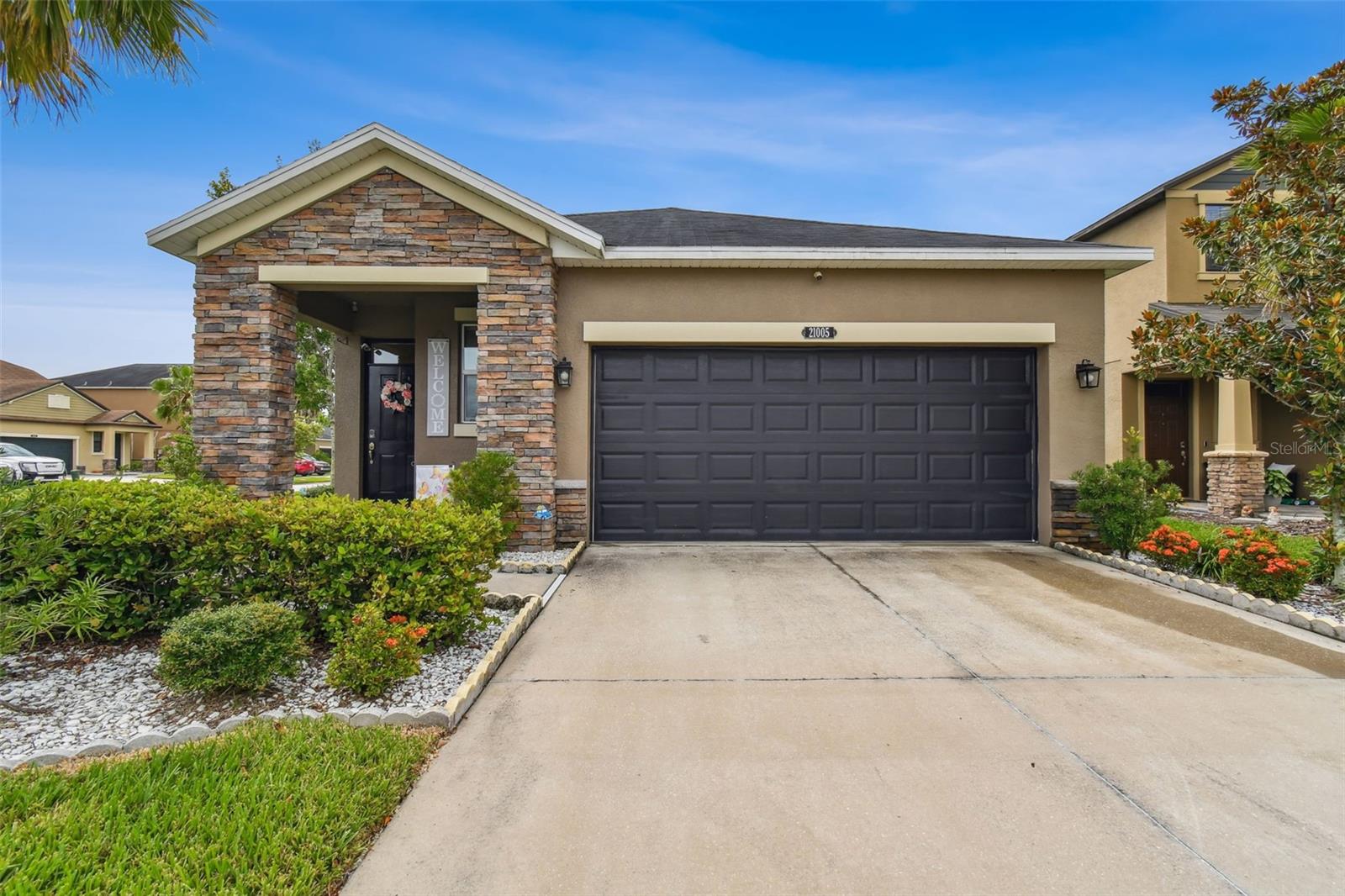 WOW... Affordable living in the sought-after master planned community of CONNERTON, which has received several awards and recognitions, including: Best Community Lifestyle Award and Gold Award for Best Lifestyle Program for a Community. Awarded by the National Association of Home Builders in 2018, these recognized Connerton's commitment to a vibrant community environment and its comprehensive lifestyle program with diverse activities and events for residents. It’s your family and they deserve to live comfortably with miles of serene trails, nature preserves, sport facilities, resort-style clubhouse with two pools, a golf course, parks, playgrounds, and more. Assigned highly rated schools with options for charter and private schools nearby, like the new Pinecrest Academy, Dayspring Academy, Angeline Academy of Innovation, among others. The house has three bedrooms and two bathrooms, with 1,614 square feet of smart living space. It includes high ceilings, an open concept layout, an island kitchen, a laundry room, a covered lanai, and a fenced backyard on a CORNER LOT. This move-in-ready home is very well kept, located in a suburban setting away from the crowd, yet a short drive from shopping, restaurants, entertainment, churches, hospital/ER, medical facilities, the I-75 and Sucoast Expressway corridors, and everything else the Greater Tampa Bay region has available for you. Schedule your private showing today. Soon you might be calling this address HOME.