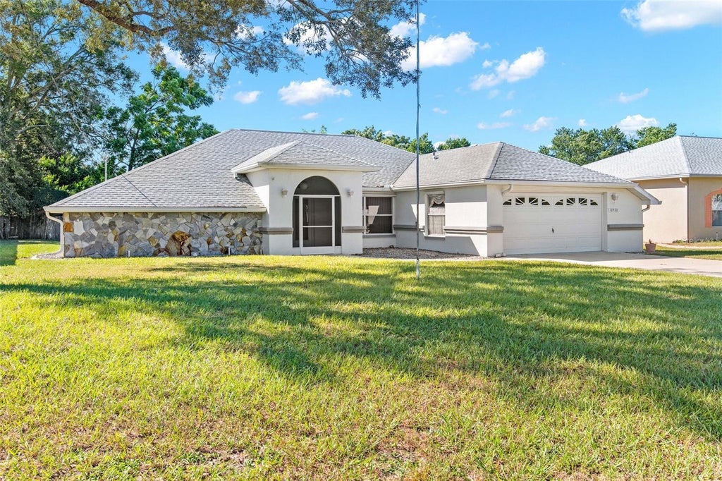 Photo of 10460 Utah Street, Spring Hill, FL 34608 (MLS # W7890561)