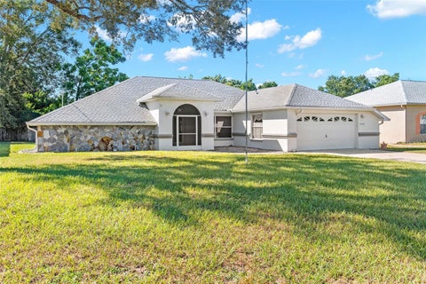 Photo of 10460 Utah Street, Spring Hill, FL 34608 (MLS # W7890561)