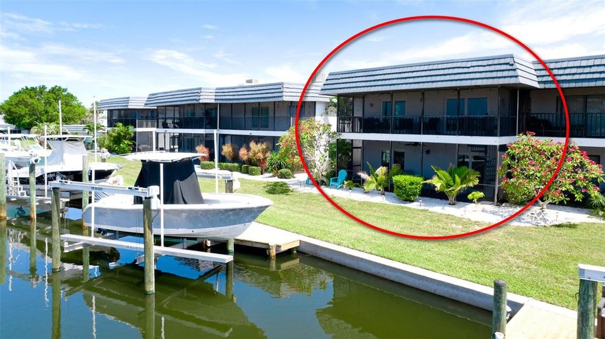 Live the ultimate Florida lifestyle in this beautifully updated 2-bedroom (easy 3rd bedroom conversion if desired), 2.5-bath townhome with 1,728 square feet of living space, nestled in the highly sought-after Flamingo Cay Community. Boater’s Dream: Private 10,000 lb boat lift with electric and water (2021)—perfect for quick access to the bay and Gulf waters right out your back door. This home is MOVE-IN READY with a long list of premium upgrades: Hurricane impact windows throughout entire home and 5 sets of hurricane impact sliding glass doors (2021) New garage door (2022) | Interior paint, doors & moldings (2021) Whole-house generator-ready with dedicated electric service Home warranty paid through 11/2025 Water softener (2022) | Hot water heater (2023) Both A/C systems under service plan (2021 & 2016) | Ductwork replaced (2021) Blackout slide blinds in primary bedroom + plantation shutters in both bedrooms Downstairs offers a flexible layout with a spacious family room + office (ideal for a 3rd bedroom), half bath, and 2-car garage. Additional highlights include diagonal tile flooring, crown molding, new electric raised 3 feet (2025), and stucco walls with PVC moldings for durability. Upstairs, enjoy open living and dining spaces with crown molding, solid wood cabinetry, quartz countertops in the kitchen and baths, and newer appliances including refrigerator (2024), dishwasher (2023), and washer/dryer (2022). Elegant finishes like plantation shutters, solid wood interior doors, and new light/fans (2021) elevate the home’s coastal charm.