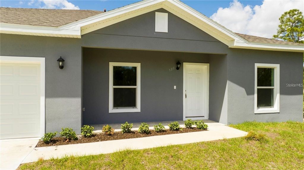 Photo of 580 Treemont Avenue SW, Palm Bay, FL 32908 (MLS # O6386426)