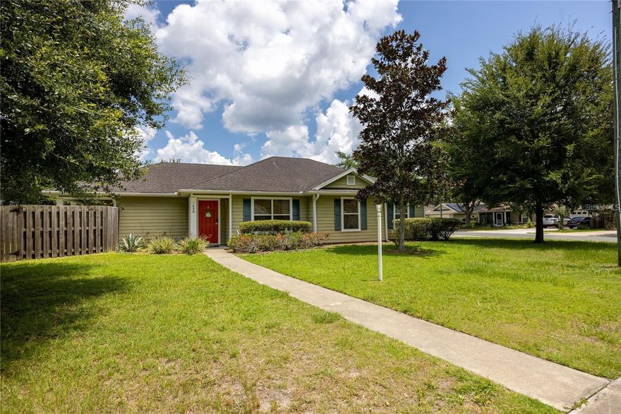 Beautiful home well maintained for rent in NE Gainesville's North Point at Ironwood. This 3 bedroom, 2 bathroom home has an open concept and is full of natural light. Built in 2007, this home is on .24 of an acre on a corner lot. The neighborhood has sidewalks, underground utilities and abuts Ironwood Golf Course. From the covered front entry, you enter the large, open Great Room with tray ceiling. The home has luxury vinyl plank flooring and tile throughout, no carpet. To the right is the open dining area and to the left is the Great Room with a door opening to the covered rear porch. Straight ahead is the Primary Suite with walk-in closet and ensuite bathroom. The bathroom has a tub/shower and large vanity for storage. From the foyer, a few steps forward and you are at the open kitchen with breakfast bar, separate breakfast nook, wood cabinets, stainless steel appliances include a gas range. To the right of the kitchen is the hall that leads to two guest bedrooms and the shared guest bathroom. Off the breakfast nook is the 2 car garage and the laundry area with washer and dryer. Lease includes lawn maintenance. $54 application fee. Security deposit required. Pets negotiable with pet fee and deposit. Tenant to pay for their own internet and utilities. Unfurnished.