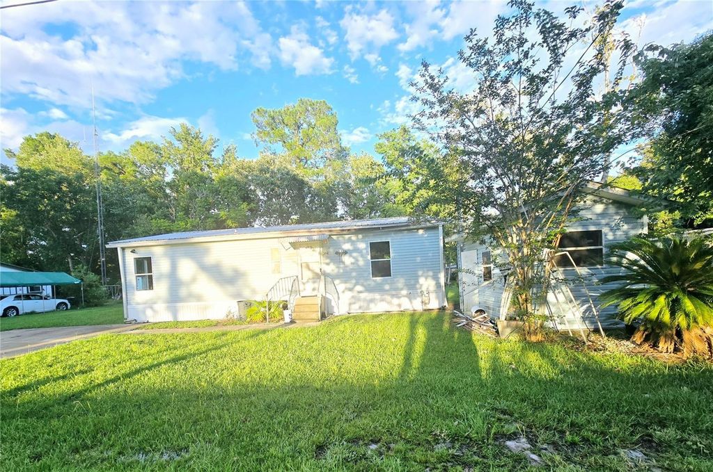 Photo of 208 Pine Tree Trl, Crescent City, FL 32112 (MLS # V4947287)