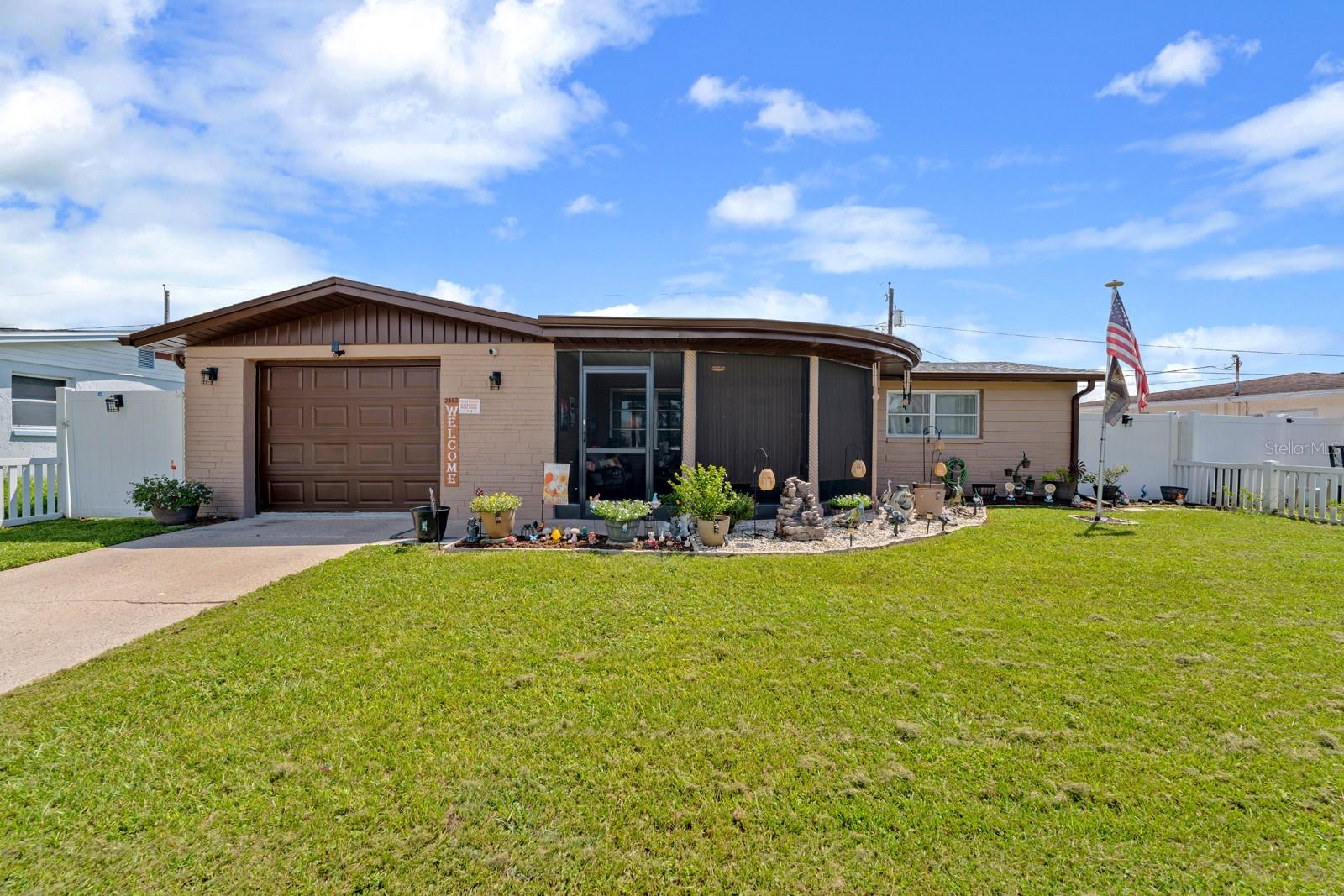 Welcome to this beautifully updated 3-bedroom, 2-bathroom home located in Holiday, FL, just minutes from gulf beaches, Anclote fishing pier, and Historic Tarpon Springs Sponge docks. This house sits on Arcadia Road in a fantastic location that puts you close to waterfront activities and coastal attractions.
Step inside to discover an open floor plan with gorgeous gray wood plank flooring throughout the main living areas. The chef's kitchen features white shaker cabinets, granite countertops, stainless steel appliances, LED recessed lighting, and a stylish tile backsplash. Both bathrooms have been thoughtfully updated with new vanities, 18x18 porcelain tiles, and elegant marble vanity tops. The primary bathroom received a complete professional remodel with a modern shower featuring full-length quartz stonework.
Recent improvements include a newer roof installed in 2022, new ceiling fans and light fixtures throughout, plus 5.5-inch baseboards and new 6-panel doors with updated hardware. Fresh neutral paint brightens the interior while a beautiful new exterior color enhances curb appeal.
Outside, you'll love the new screen-enclosed front porch and fresh landscaping with new plants and mulch. The backyard offers complete privacy with white vinyl fencing. New window treatments complete the move-in ready feel of this home.
This property combines modern updates with comfortable living in an unbeatable location. You're just moments away from Florida's beautiful gulf coast while enjoying all the comforts of a renovated home and NO FLOOD ZONE!