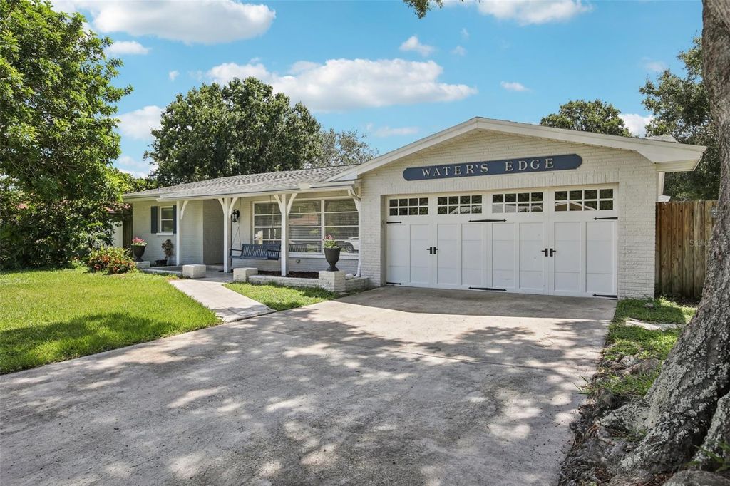 Photo of 1317 Ranchwood Drive E, Dunedin, FL 34698 (MLS # TB8412040)