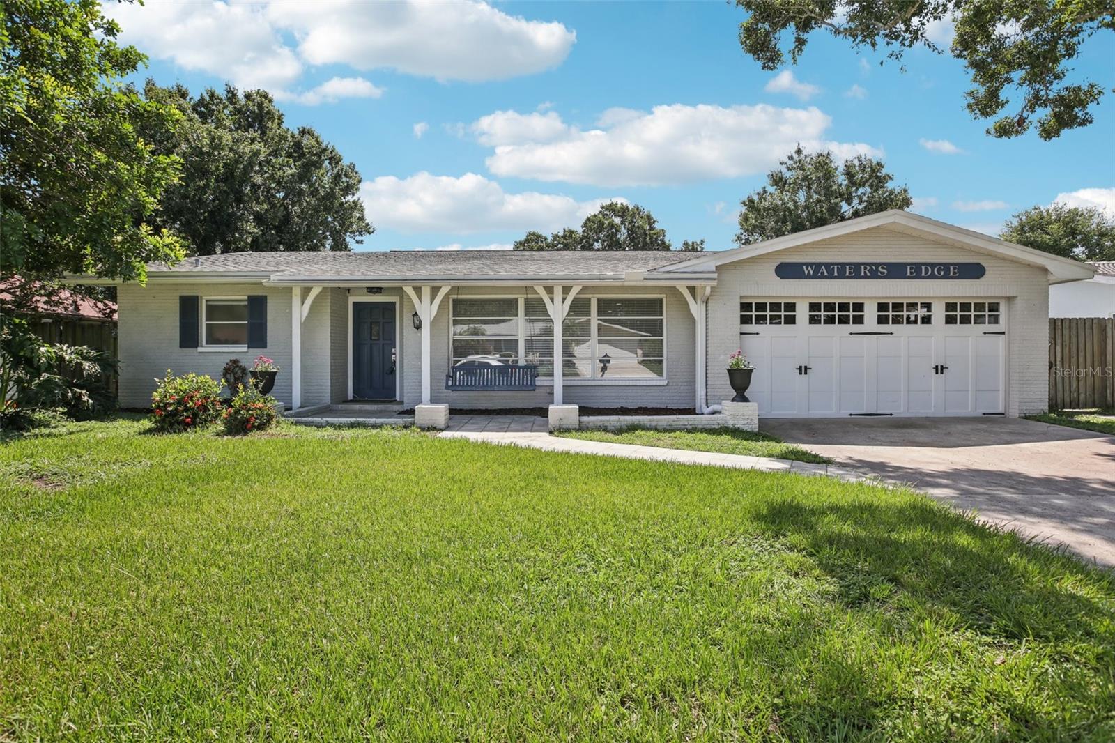 One or more photo(s) has been virtually staged. This one just feels right from the moment you pull up—great curb appeal, a welcoming vibe, and a neighborhood that you'll genuinely enjoy being part of. Remodeled within the last five years, this 2-bedroom + den/possible bedroom, 3-bathroom home with a 2-car garage is ready for your personal touches.
Inside, you’ll find a spacious split floor plan and a modern layout that feels inviting. Enjoy the air conditioning system, which has been upgraded with all-new ductwork, while sitting in the oversized family/sunroom. Or step out back to the screened patio—ideal for morning coffee or evening relaxation —overlooking a serene canal. With great bones, an ideal layout, and a prime location in sought-after Dunedin Ranchwood Estates, this home is move-in ready and full of potential. Don’t miss your chance to make it yours!