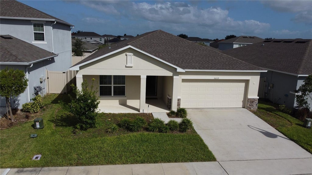 Photo of 5609 Costa Blanca Way, Davenport, FL 33897 (MLS # O6449429)