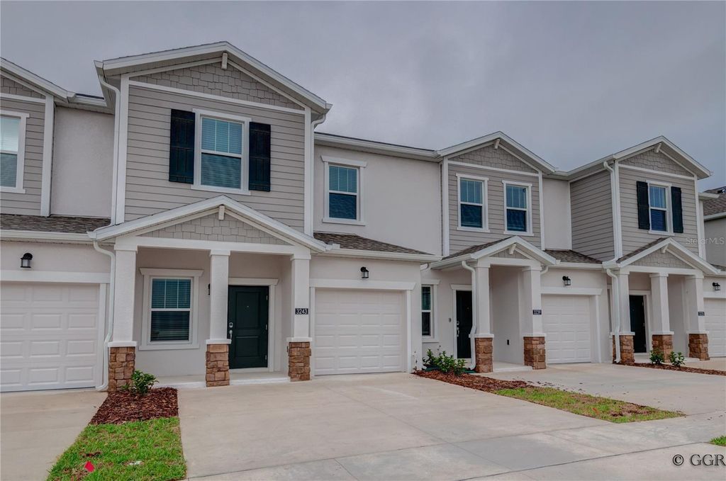 Photo of 3243 Laurent Loop, Davenport, FL 33837 (MLS # O6398344)