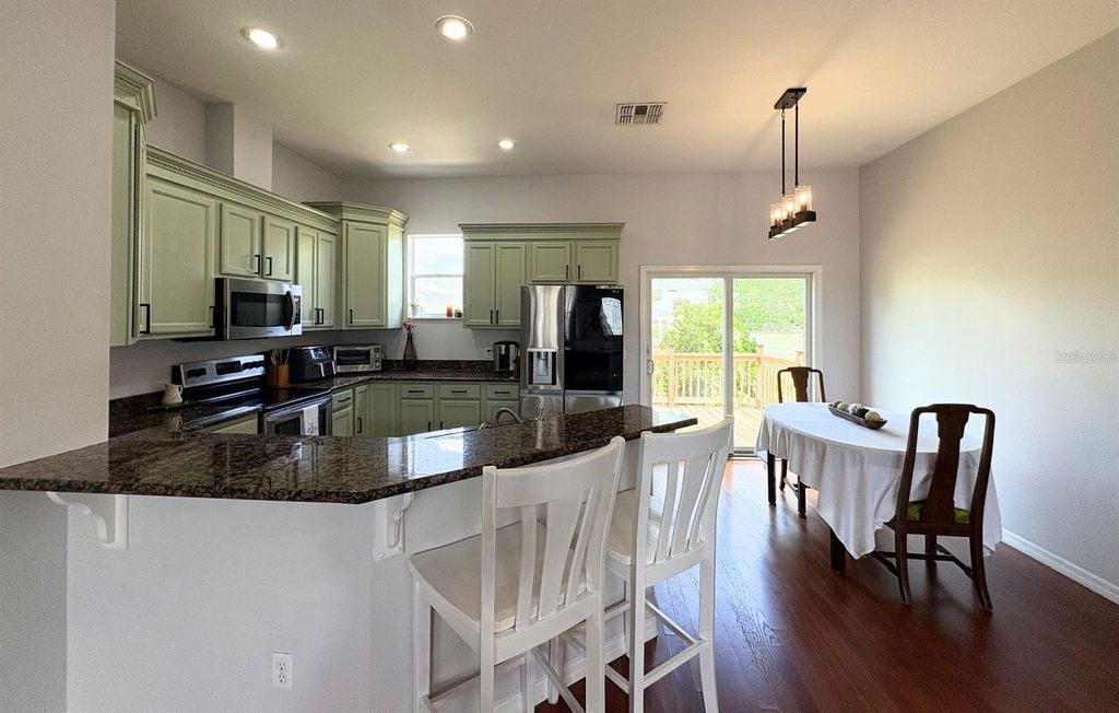 Photo of 404 E Chelsea Street, Tampa, FL 33603 (MLS # TB8445941)