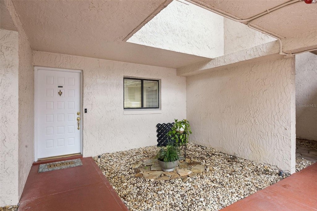 Photo of 1166 Carmel Circle #110, Casselberry, FL 32707 (MLS # O6441465)