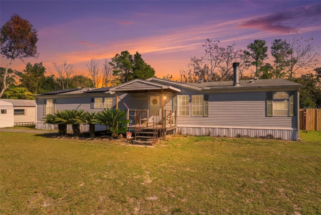 Photo of 10029 Chestnut Drive, Hudson, FL 34669 (MLS # TB8551689)