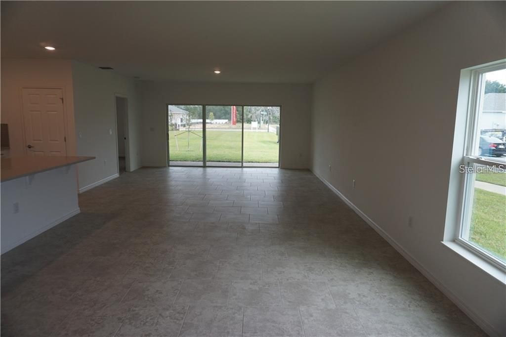 Photo of 10155 Grande Loop, Clermont, FL 34711 (MLS # O6397635)
