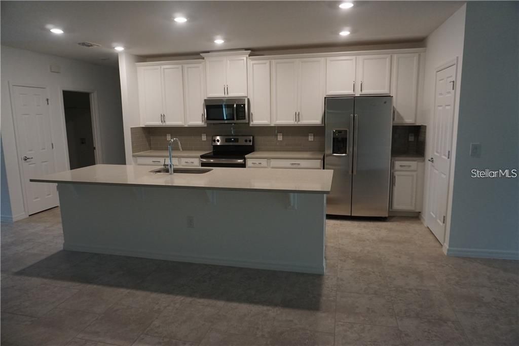 Photo of 10155 Grande Loop, Clermont, FL 34711 (MLS # O6397635)