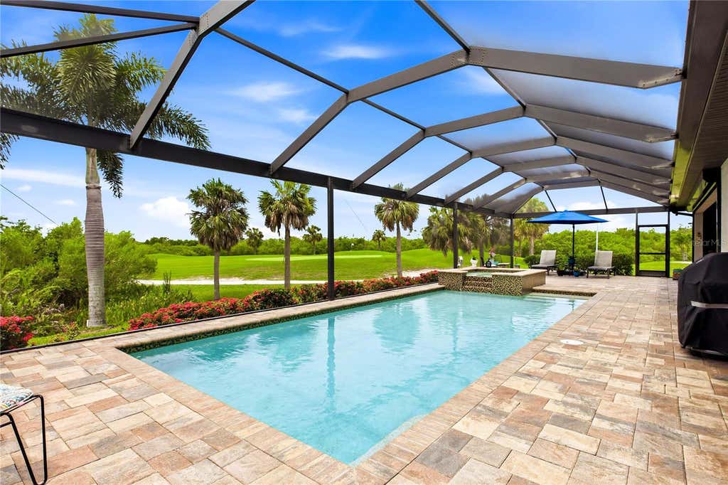 Photo of 11795 Royal Tee Circle, Cape Coral, FL 33991 (MLS # A4700418)