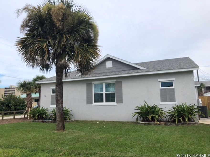 NEW BUILD!!! Beautiful 3 bedroom, 2 bath, new home. Wood grain tile floors through-out, quartz counter tops, subway glass tile back splash, all new appliances, beautiful bathrooms, open, spacious, bright beach side living at its best with large porch on back with fans, privacy fenced back yard with stone fire pit and pavers. You must see this house! walk across street to beach access, walk to dining and entertainment. Absolutely gorgeous home at a great price!!